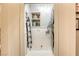 Well-organized laundry room with a stackable washer and dryer at 4412 Desert Park Ave, North Las Vegas, NV 89085