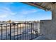 Apartment balcony overlooking a residential street and distant mountains at 451 Sellers Pl, Henderson, NV 89011