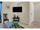 Living room with TV, chair and entryway at 451 Sellers Pl, Henderson, NV 89011