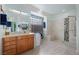 Bathroom with walk-in shower, soaking tub, and dual sinks at 4618 Atlantico St, Las Vegas, NV 89135