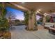 Relaxing covered patio with seating area and view of the backyard at 4618 Atlantico St, Las Vegas, NV 89135