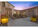 Inviting entryway with yellow planters and a gated entrance at 4618 Atlantico St, Las Vegas, NV 89135