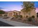 Single story home with attractive landscaping and a two-car garage at 4618 Atlantico St, Las Vegas, NV 89135