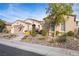 Single-story home with desert landscaping, attached garage, and neutral color scheme at 4618 Atlantico St, Las Vegas, NV 89135