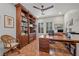 Home office with built-in bookshelves and a large desk at 4618 Atlantico St, Las Vegas, NV 89135