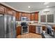 Bright kitchen with stainless steel appliances and wood cabinetry at 4618 Atlantico St, Las Vegas, NV 89135