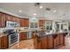 Modern kitchen featuring stainless steel appliances and rich wood cabinets at 4618 Atlantico St, Las Vegas, NV 89135