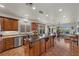 Spacious kitchen with island, stainless steel appliances, and ample wood cabinetry at 4618 Atlantico St, Las Vegas, NV 89135