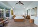 Main bedroom with light blue walls and wood flooring at 4618 Atlantico St, Las Vegas, NV 89135