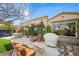 Spacious backyard patio with seating area and built-in grill at 4618 Atlantico St, Las Vegas, NV 89135