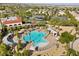 Resort-style pool with surrounding lounge chairs and a tennis court at 4618 Atlantico St, Las Vegas, NV 89135