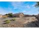 Spacious backyard with gravel and desert landscaping at 4911 E Parkwood Dr, Pahrump, NV 89061