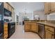 Spacious kitchen featuring stainless steel appliances and granite countertops at 4911 E Parkwood Dr, Pahrump, NV 89061