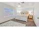 Main bedroom with a king-size bed and plenty of natural light at 513 Rafkin Pl, Henderson, NV 89052