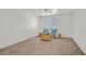 Secondary bedroom with two chairs and a coffee table at 513 Rafkin Pl, Henderson, NV 89052