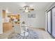 Bright dining area adjacent to the kitchen with seating for four at 513 Rafkin Pl, Henderson, NV 89052