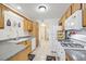 Well-equipped kitchen with wood cabinets and modern appliances at 513 Rafkin Pl, Henderson, NV 89052