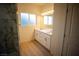 Modern bathroom with double vanity and marble shower at 521 Antelope Ave, Pahrump, NV 89060