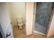 Bathroom with toilet and marble shower at 521 Antelope Ave, Pahrump, NV 89060