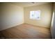 Bright bedroom featuring light walls and wood-look flooring at 521 Antelope Ave, Pahrump, NV 89060