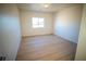 Well-lit bedroom with a window and light wood flooring at 521 Antelope Ave, Pahrump, NV 89060