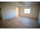 Bright bedroom with light flooring and ceiling fan at 521 Antelope Ave, Pahrump, NV 89060