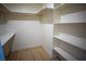 Spacious walk-in closet with ample shelving and hanging rod at 521 Antelope Ave, Pahrump, NV 89060