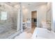 Spa-like bathroom with marble shower and soaking tub at 5260 Brayden Ct, Las Vegas, NV 89131