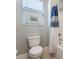 Clean bathroom with toilet, bathtub, shower, and blue shower curtain at 5260 Brayden Ct, Las Vegas, NV 89131