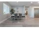 Bright dining room features a table with six chairs and a view to the Gathering room at 5260 Brayden Ct, Las Vegas, NV 89131