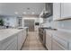 Modern kitchen with stainless steel appliances and white cabinets at 5260 Brayden Ct, Las Vegas, NV 89131