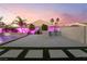 Outdoor kitchen and patio area with pathway at 5260 Brayden Ct, Las Vegas, NV 89131