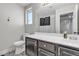 Clean bathroom with subway tile and dark vanity at 5313 Dawn Break Canyon St, North Las Vegas, NV 89031