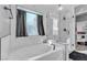 Modern bathroom featuring a soaking tub and walk-in shower at 5313 Dawn Break Canyon St, North Las Vegas, NV 89031