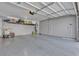 Two-car garage with epoxy flooring and overhead storage at 5313 Dawn Break Canyon St, North Las Vegas, NV 89031