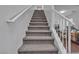 Carpeted staircase leading to the upper level at 5313 Dawn Break Canyon St, North Las Vegas, NV 89031