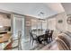 Open-concept dining area with a view of the kitchen featuring an island with seating at 5428 Brazelton St, North Las Vegas, NV 89081