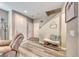 Inviting entryway featuring wood-look floors and a cozy bench with shoe storage at 5428 Brazelton St, North Las Vegas, NV 89081