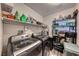 Well-organized laundry room with modern washer, dryer, and storage at 5428 Brazelton St, North Las Vegas, NV 89081