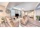 Open living room featuring a neutral color scheme and wood-look floors at 5428 Brazelton St, North Las Vegas, NV 89081