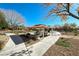 Community park featuring covered picnic tables, walking paths, and playground equipment at 5428 Brazelton St, North Las Vegas, NV 89081