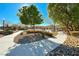 Community park featuring a walkway, trees, and green space with a playground at 5428 Brazelton St, North Las Vegas, NV 89081