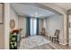 Sitting room with a teal rug and french doors at 5428 Brazelton St, North Las Vegas, NV 89081