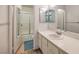 Clean bathroom with a shower-tub combination and a wide mirror over the vanity at 5655 Vineyard Ln # 0, Las Vegas, NV 89110