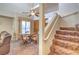 Dining room featuring staircase access, natural light, and seating for four at 5655 Vineyard Ln # 0, Las Vegas, NV 89110