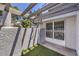 Enclosed patio area with artificial grass, offering a private and low-maintenance retreat at 5655 Vineyard Ln # 0, Las Vegas, NV 89110