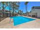 Inviting community pool surrounded by seating, offering a refreshing and social outdoor space at 5655 Vineyard Ln # 0, Las Vegas, NV 89110