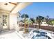 Elevated balcony overlooking a sparkling pool and a scenic landscape at 5737 Heather Breeze Ct, Las Vegas, NV 89141