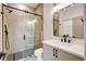 Modern bathroom with a glass shower and floating vanity at 5737 Heather Breeze Ct, Las Vegas, NV 89141