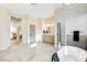 Spacious bathroom with a large soaking tub and double vanity at 5737 Heather Breeze Ct, Las Vegas, NV 89141